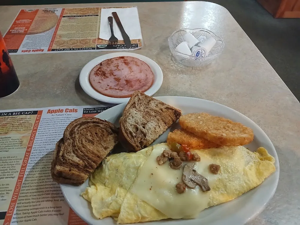 Italian Omelet with Hash Browns and Side of Ham and Rye Toast